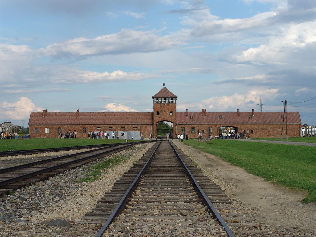  The gatehouse at the former German Nazi concentration camp of Auschwitz II (Birkenau), leading to the gas chambers. Note that this is inside the camp looking back from the loading ramp to the “Gate of Death”. The gatehouse was built in 1943 and the rail spur began operating in May 1944. Before then, deportees arrived at the old Judenrampe over two kilometres away and either walked or were taken in trucks to the gas chambers.