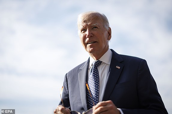 epa11580067 US President Joe Biden speaks to members of the media on the South Lawn of the White House after arriving on Marine One in Washington, DC, USA, 02 September 2024. Biden and Vice President Kamala Harris will meet with the US hostage deal negotiating team at the White House on 02 September, after Israel recovered the bodies of six hostages who it said had been killed by their Hamas captors in Gaza.  EPA/TING SHEN / POOL