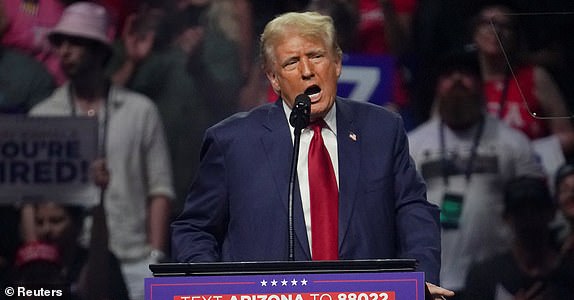 Republican presidential nominee and former U.S. President Donald Trump speaks at a rally in Glendale, Arizona, U.S., August 23, 2024. REUTERS/Go Nakamura