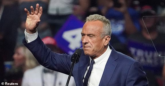 FILE PHOTO: Former independent presidential candidate Robert F. Kennedy Jr. gestures during Republican presidential nominee and former U.S. President Donald Trump's rally in Glendale, Arizona, U.S., August 23, 2024. REUTERS/Go Nakamura/File Photo