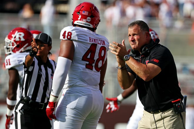 Sep 21, 2024; Blacksburg, Virginia, USA; Rutgers Scarlet Knights head coach Greg Schiano celebrates after a play during the second quarter of the game against the Virginia Tech Hokies at Lane Stadium. Mandatory Credit: Peter Casey-Imagn Images