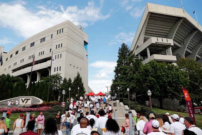 Sep 21, 2024; Blacksburg, Virginia, USA; Fans enter the stadium before the game between the Virginia Tech Hokies and the Rutgers Scarlet Knights at Lane Stadium. Mandatory Credit: Peter Casey-Imagn Images