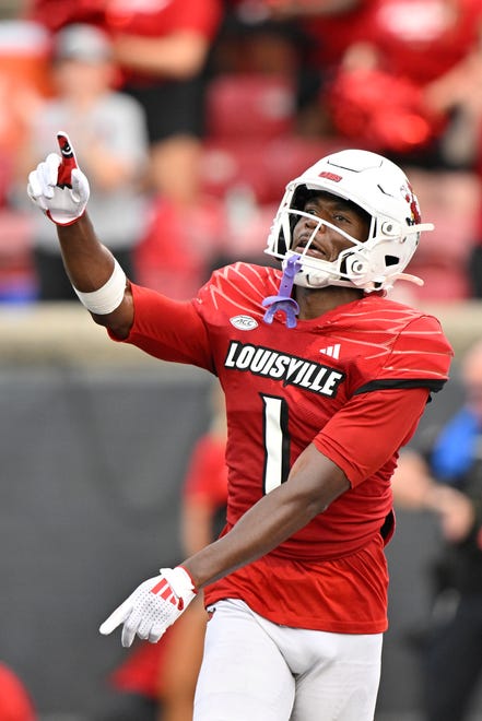 Sep 21, 2024; Louisville, Kentucky, USA; Louisville Cardinals wide receiver Ja'Corey Brooks (1) celebrates a touchdown during the second half against the Georgia Tech Yellow Jackets at L&N Federal Credit Union Stadium. Mandatory Credit: Jamie Rhodes-Imagn Images