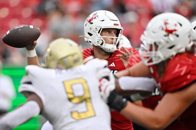 Sep 21, 2024; Louisville, Kentucky, USA; Louisville Cardinals quarterback Tyler Shough (9) looks to pass against the Georgia Tech Yellow Jackets during the second half at L&N Federal Credit Union Stadium. Louisville defeated Georgia Tech 31-19. Mandatory Credit: Jamie Rhodes-Imagn Images