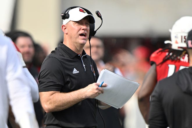 Sep 21, 2024; Louisville, Kentucky, USA; Louisville Cardinals head coach Jeff Brohm calls out instructions during the first half against the Georgia Tech Yellow Jackets at L&N Federal Credit Union Stadium. Mandatory Credit: Jamie Rhodes-Imagn Images