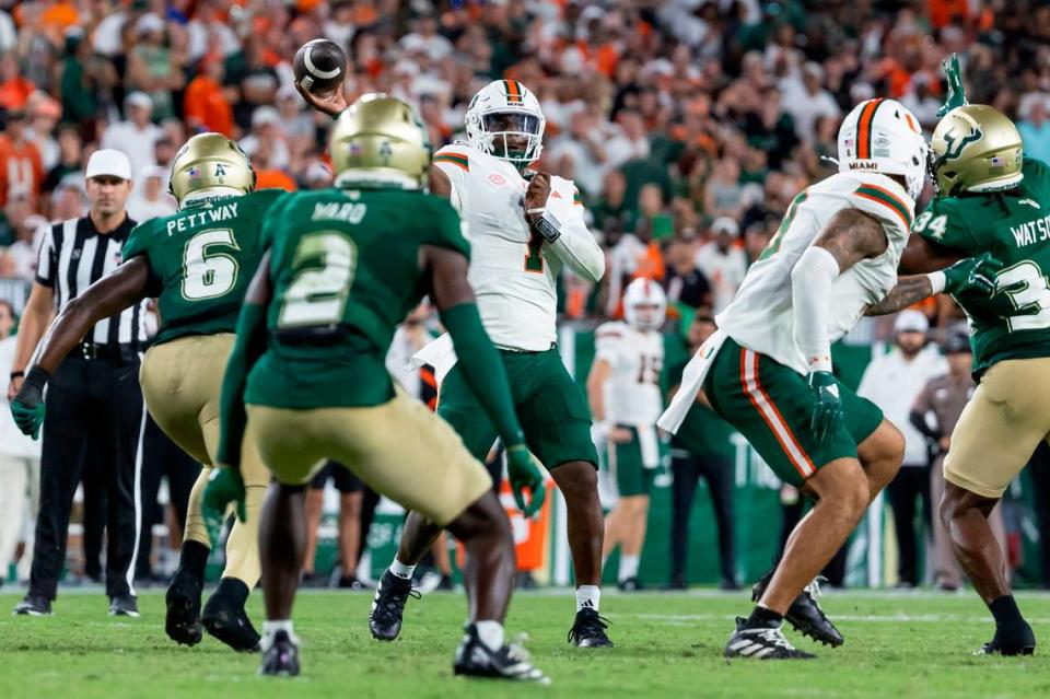 Miami Hurricanes quarterback Cam Ward (1) throws the ball in the second half of his NCAA college football game against the South Florida Bulls at the Raymond James Stadium on Saturday, Sept. 21, 2024, in Tampa, Fla.