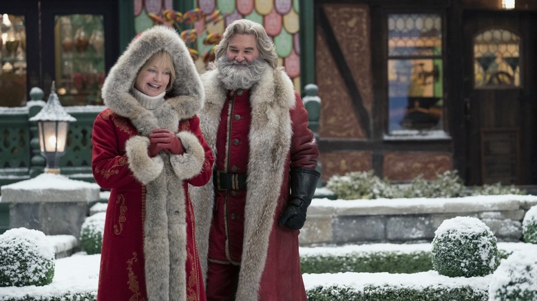 Mrs. Claus and Santa smiling outside The Christmas Chronicles 2