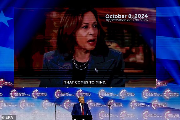 epa11679082 Former US President and Republican presidential nominee Donald Trump speaks at the Turning Point PAC campaign rally at the Gas South Arena, in Duluth, Georgia, USA, 23 October 2024. Trump is running against Democratic US Vice President Kamala Harris.  EPA/ERIK S. LESSER