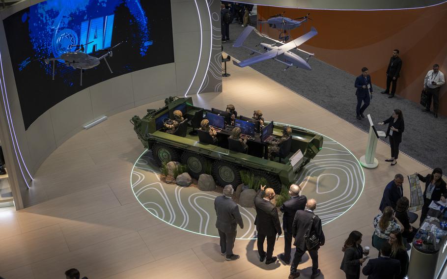 Attendees view a display by Israel Aerospace Defense