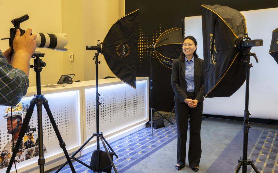 An attendee gets their headshot taken