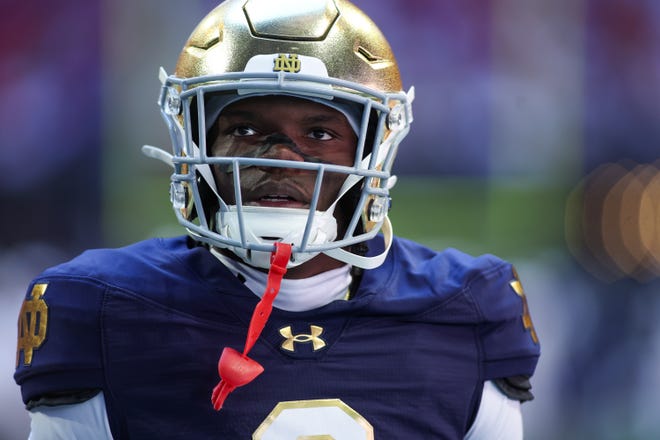 Oct 19, 2024; Atlanta, Georgia, USA; Notre Dame Fighting Irish safety Adon Shuler (8) walks off the field before a game against the Georgia Tech Yellow Jackets at Mercedes-Benz Stadium. Mandatory Credit: Brett Davis-Imagn Images