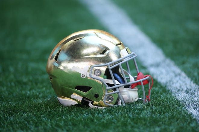 Oct 19, 2024; Atlanta, Georgia, USA; A Notre Dame Fighting Irish helmet on the field before a game against the Georgia Tech Yellow Jackets at Mercedes-Benz Stadium. Mandatory Credit: Brett Davis-Imagn Images