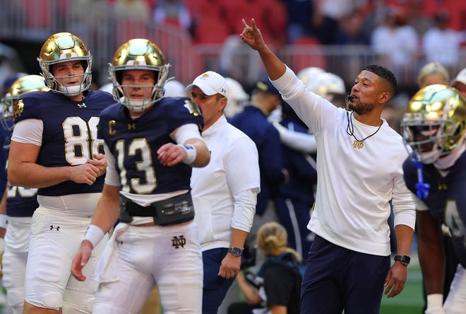 ATLANTA, GEORGIA - OCTOBER 19: Head coach Marcus Freeman of the Notre Dame Fighting Irish looks on during warmups prior to facing the Georgia Tech Yellow Jackets at Bobby Dodd Stadium on October 19, 2024 in Atlanta, Georgia. (Photo by Kevin C. Cox/Getty Images)