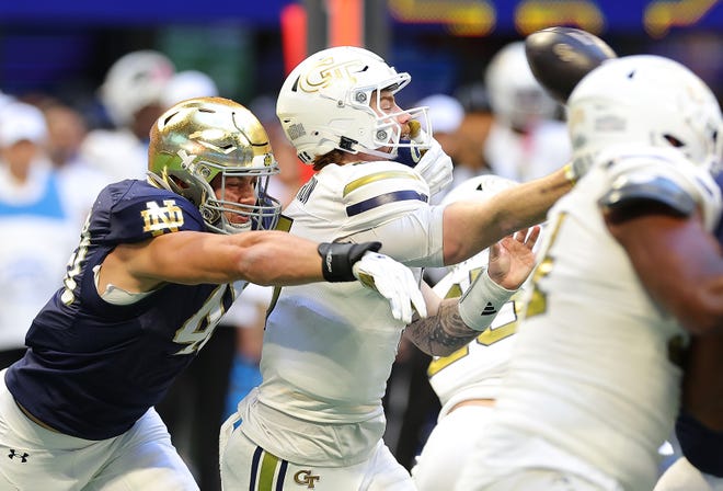 ATLANTA, GEORGIA - OCTOBER 19: Joshua Burnham #40 of the Notre Dame Fighting Irish forces an incomplete pass by Zach Pyron #5 of the Georgia Tech Yellow Jackets during the second quarter at Bobby Dodd Stadium on October 19, 2024 in Atlanta, Georgia. (Photo by Kevin C. Cox/Getty Images)