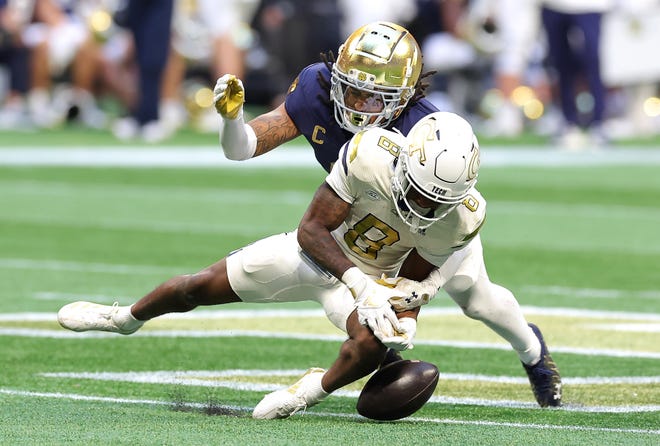 ATLANTA, GEORGIA - OCTOBER 19: Xavier Watts #0 of the Notre Dame Fighting Irish breaks up a reception intended for Malik Rutherford #8 of the Georgia Tech Yellow Jackets during the fourth quarter at Bobby Dodd Stadium on October 19, 2024 in Atlanta, Georgia. (Photo by Kevin C. Cox/Getty Images)