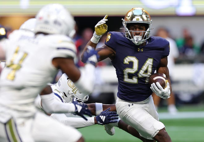 ATLANTA, GEORGIA - OCTOBER 19: Jadarian Price #24 of the Notre Dame Fighting Irish rushes against the Georgia Tech Yellow Jackets during the fourth quarter at Bobby Dodd Stadium on October 19, 2024 in Atlanta, Georgia. (Photo by Kevin C. Cox/Getty Images)