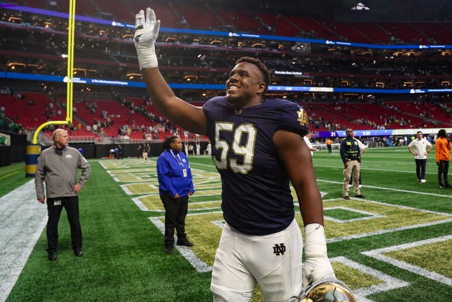 Oct 19, 2024; Atlanta, Georgia, USA; Notre Dame Fighting Irish offensive lineman Aamil Wagner (59) celebrates after a victory over the Georgia Tech Yellow Jackets at Mercedes-Benz Stadium. Mandatory Credit: Brett Davis-Imagn Images