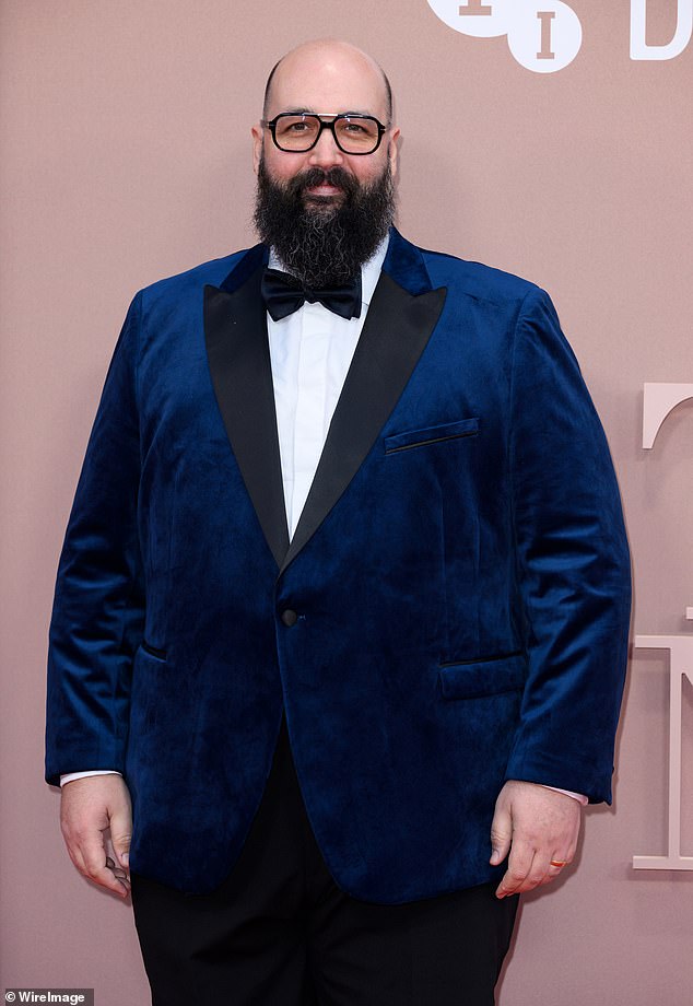 Actor Youssef Kerkour cut a suave figure in a blue velvet dinner jacket