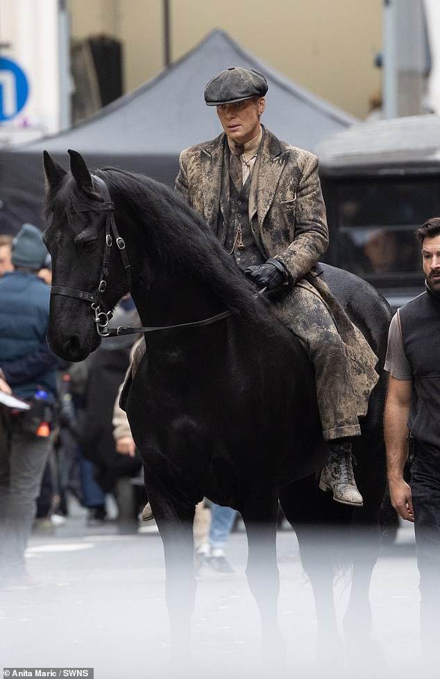 The lead actor, 48, was seen covered in mud and sporting a bloody gash on his face while riding a horse as he resumed his iconic role of Tommy Shelby for the upcoming film