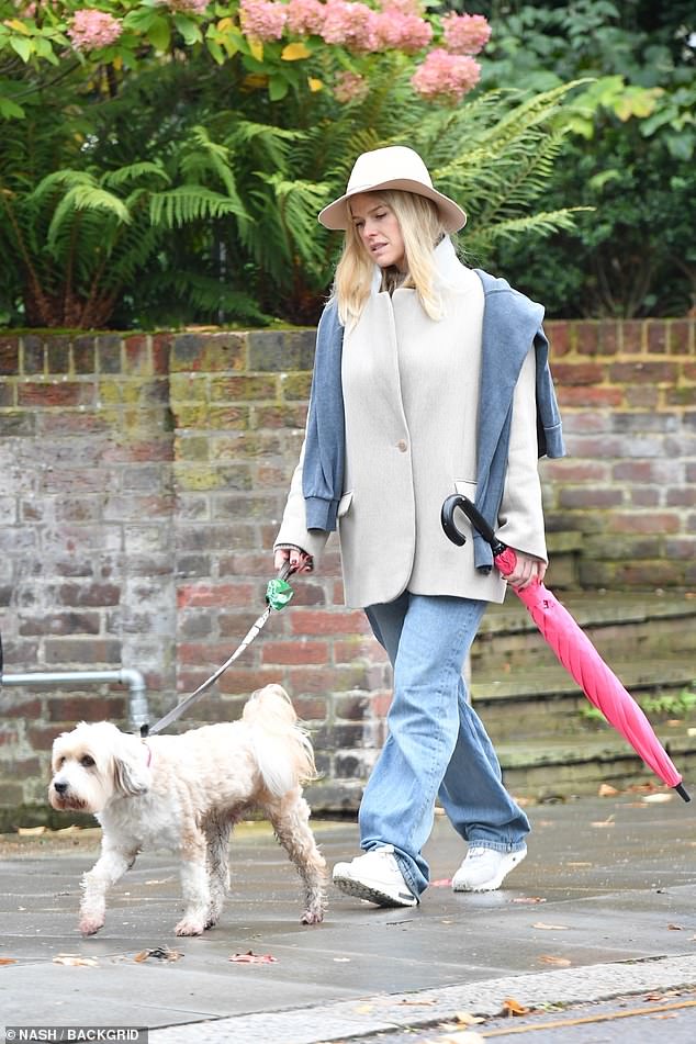 British Actress Alice Eve seen walking her dog in London