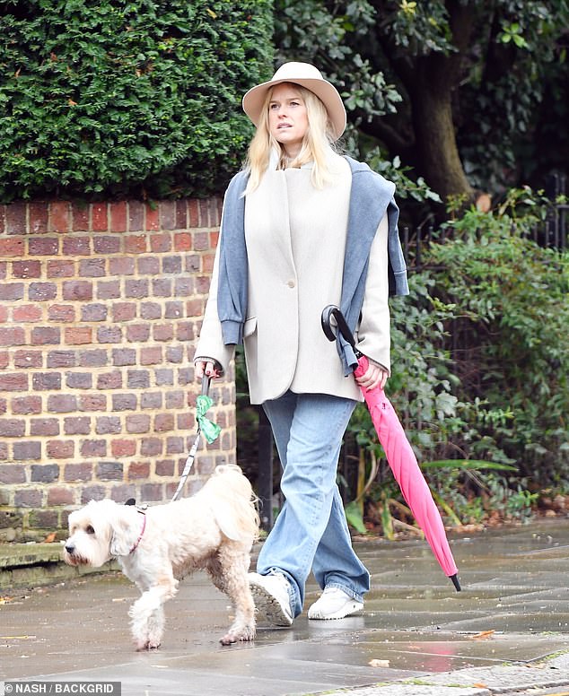 Alice Eve spotted taking her dog Buddy for a walk