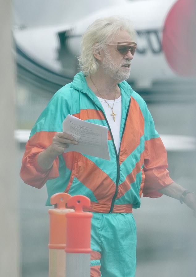 The world-famous hitmaker was spotted on the tarmac rehearsing lines for his upcoming movie with Chuck Norris, Vanilla Ice and Sophie Monk