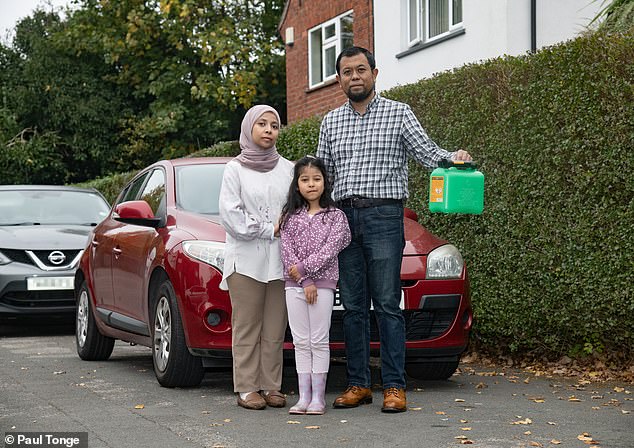 Wahyudin Permanan Syam was extremely concerned about an increase in fuel duty. He is pictured with his wife Nadia and their daughter Yasmin