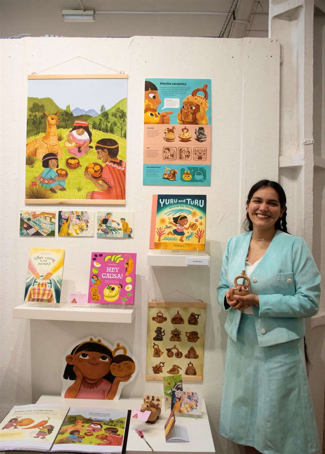 ARU children's book illustration student Elisabet Marreros with some of her artwork