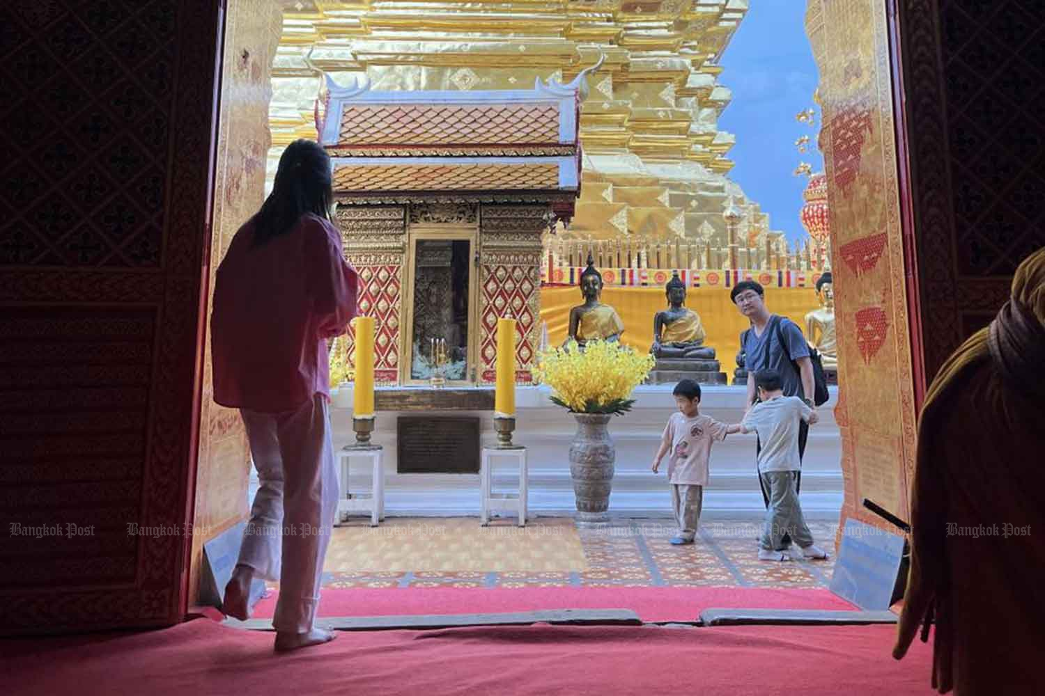 Tourists visit Wat Phra That Doi Suthep in Chiang Mai. Narumon Kasemsuk