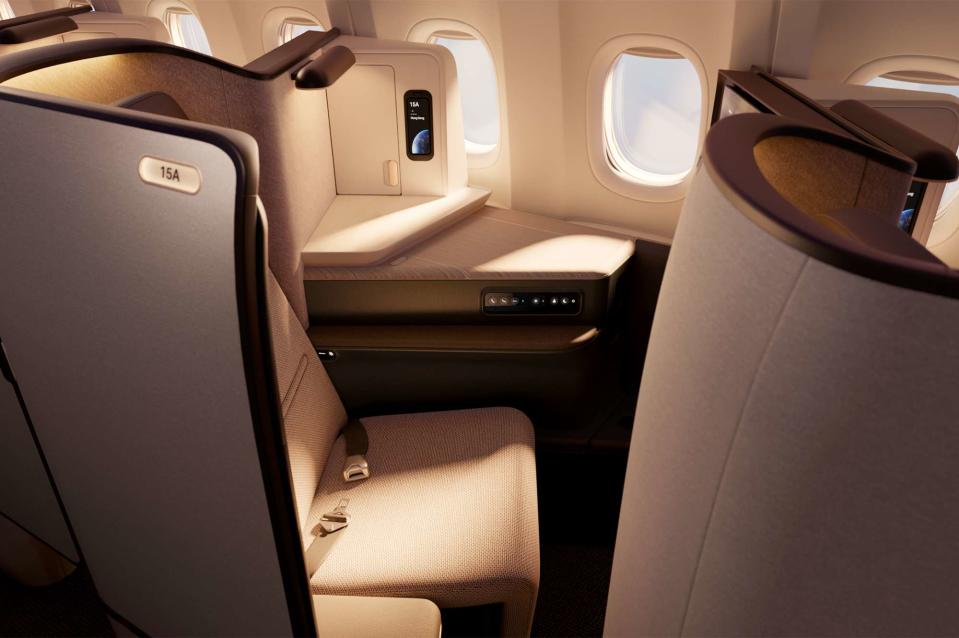 <p>Courtesy of Cathay Pacific </p> Side view of the Aria Business Class seat