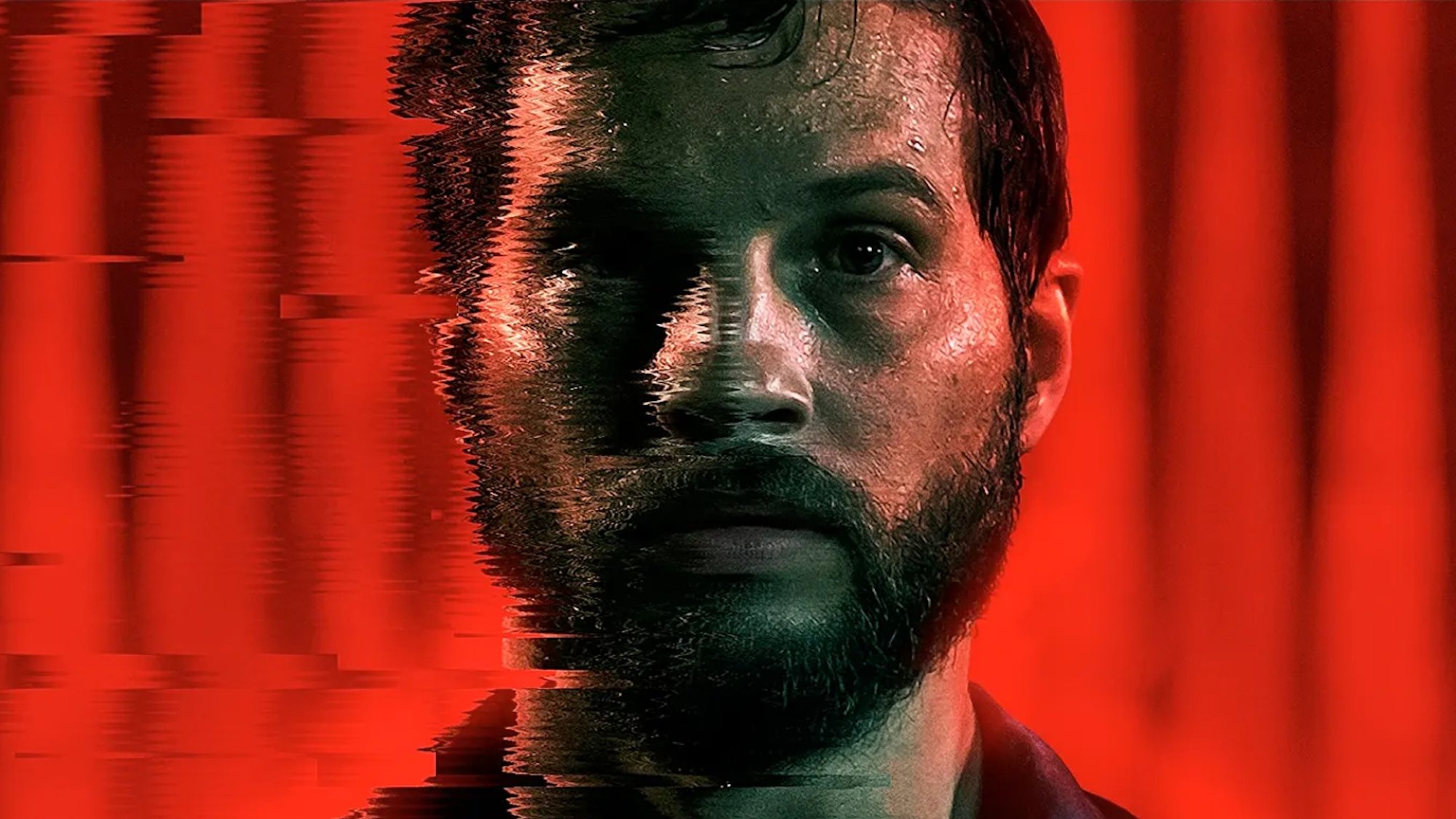 Logan Marshall-Green appears on a red background for the poster of 