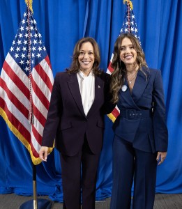 US Vice President and Democratic presidential candidate Kamala Harris (L) poses for a photograph with US actress Jessica Alba wears a Tahari ASL teal blue suit  before speaking during a campaign rally at Shell Energy Stadium in Houston, Texas, on October 25, 2024. (Photo by ROBERTO SCHMIDT / AFP) (Photo by ROBERTO SCHMIDT/AFP via Getty Images)