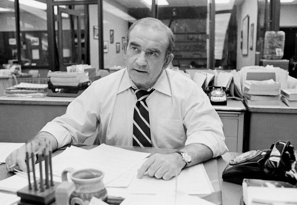 man sitting at desk