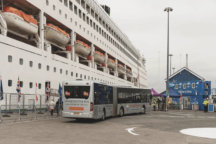 A cruise ship docks in Orkney