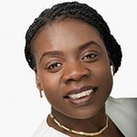 Headshot of Professor Bernadine Idowu. Bernadine is smiling and wearing a gold necklace and earrings.