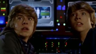 Dylan Sprouse as Zack Martin and Cole Sprouse as Cody Martin looking concerned in The Suite Life Movie