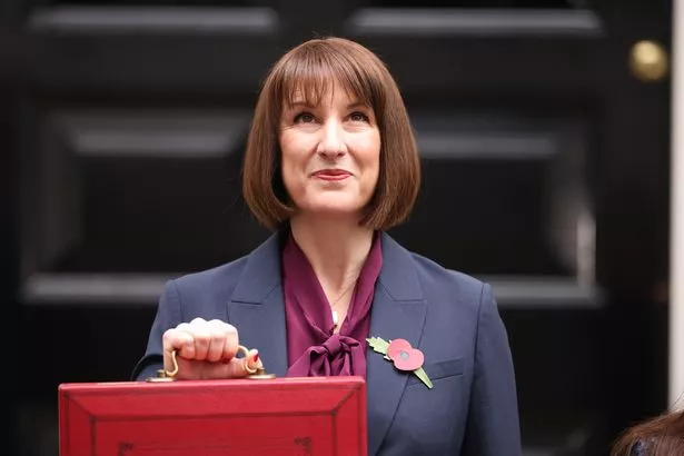 Chancellor Rachel Reeves poses with the red box outside number 11 Downing Street on October 30, 2024