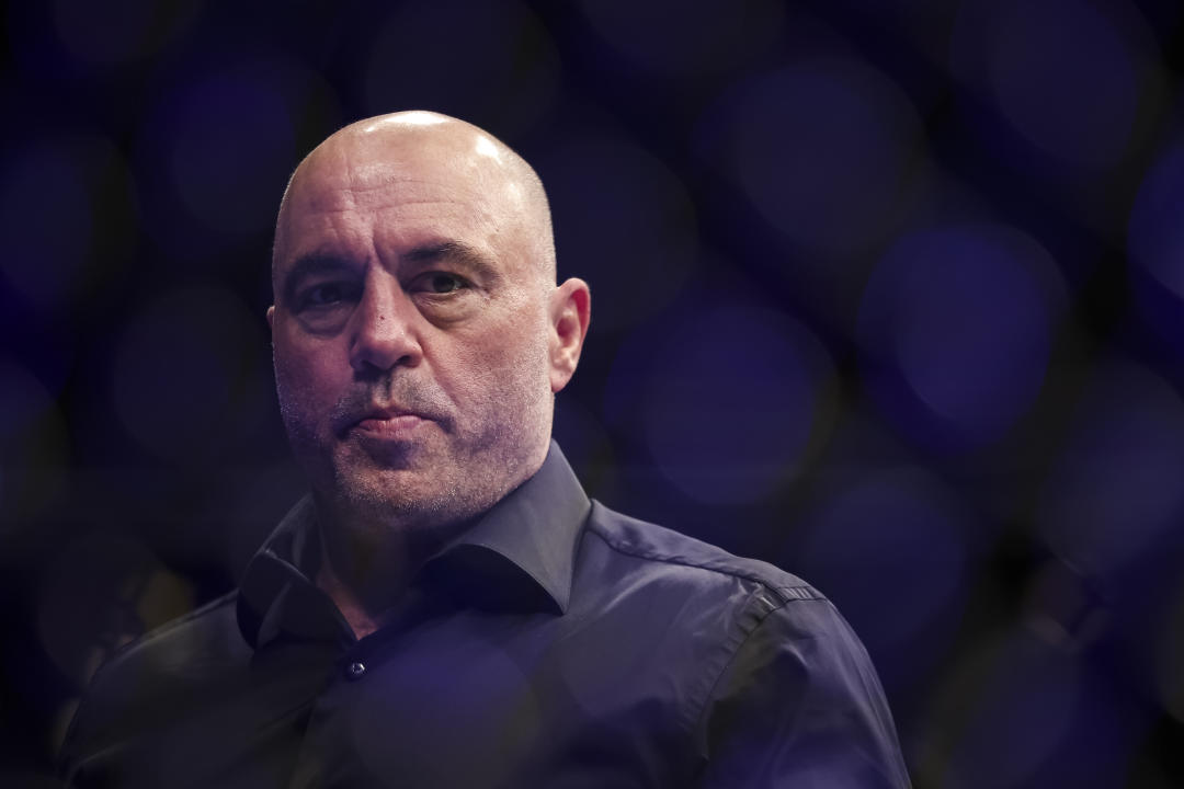 JACKSONVILLE, FLORIDA - APRIL 09: Joe Rogan looks on during the UFC 273 event at VyStar Veterans Memorial Arena on April 09, 2022 in Jacksonville, Florida. (Photo by James Gilbert/Getty Images)