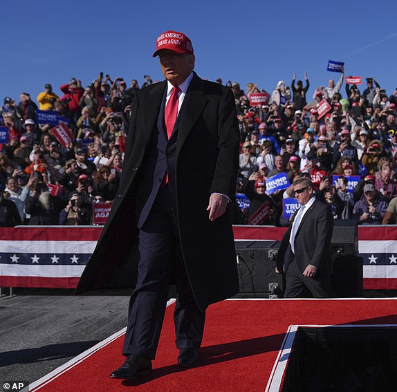 Republican presidential nominee former President Donald Trump arrives for a campaign rally in Lititz, Pa., Sunday, Nov. 3, 2024. (AP Photo/Evan Vucci)