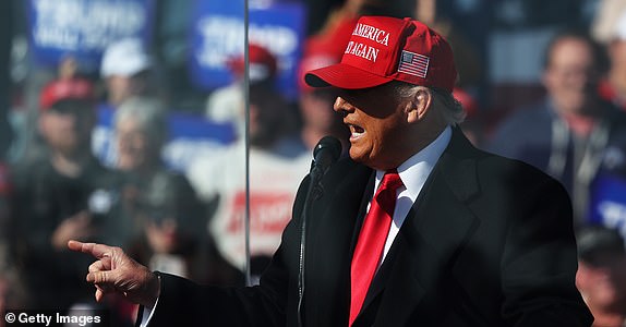 LITITZ, PENNSYLVANIA - NOVEMBER 03: Republican presidential nominee, former U.S. President Donald Trump speaks during a campaign rally at Lancaster Airport on November 03, 2024 in Lititz, Pennsylvania. Trump begins his day campaigning in battleground state of Pennsylvania, where 19 electoral votes up for grabs, where a recent New York Times and Siena College polls show a tie with Democratic presidential nominee, U.S. Vice President Kamala Harris. Trump will head to North Carolina and Georgia where Harris continues to lead in the polls.  (Photo by Michael M. Santiago/Getty Images)