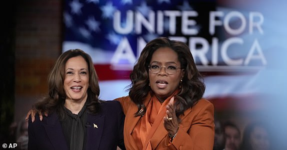 FILE - Democratic presidential nominee Vice President Kamala Harris joins Oprah Winfrey at Oprah's Unite for America Live Streaming event, Sept. 19, 2024, in Farmington Hills, Mich. (AP Photo/Paul Sancya, File)