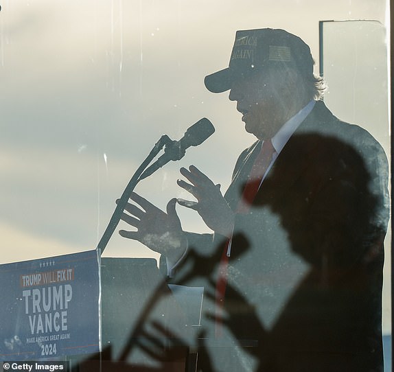 KINSTON, NORTH CAROLINA - NOVEMBER 03: Republican presidential nominee, former U.S. President Donald Trump speaks during a campaign rally at Kinston Regional Jetport on November 03, 2024 in Kinston, North Carolina. With only two days until the election, Trump is campaigning for re-election on Sunday in the battleground states of Pennsylvania, North Carolina, and Georgia. (Photo by Chip Somodevilla/Getty Images)