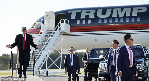 KINSTON, NORTH CAROLINA - NOVEMBER 03: Republican presidential nominee, former U.S. President Donald Trump arrives for a campaign rally at Kinston Regional Jetport on November 03, 2024 in Kinston, North Carolina. With only two days until the election, Trump is campaigning for re-election on Sunday in the battleground states of Pennsylvania, North Carolina and Georgia. (Photo by Chip Somodevilla/Getty Images)