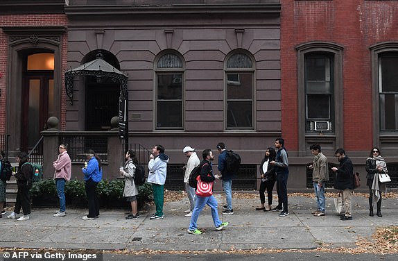 People line up to vote outside of a polling station in Philadelphia, Pennsylvania on Election Day, November 5, 2024. (Photo by MATTHEW HATCHER / AFP) (Photo by MATTHEW HATCHER/AFP via Getty Images)