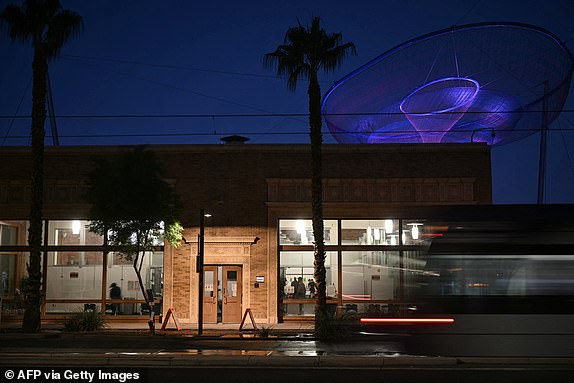 People vote inside of a polling station in downtown Phoenix, Arizona, on Election Day, November 5, 2024. (Photo by Patrick T. Fallon / AFP) (Photo by PATRICK T. FALLON/AFP via Getty Images)