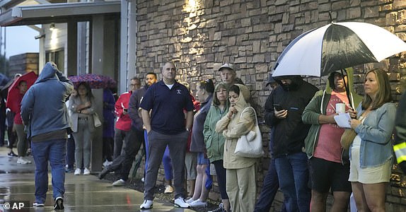 Voters line up to cast their ballots during Election Day at the Richard and Meg Weekley Community Center on Tuesday, Nov. 5, 2024 in Cypress, Texas. (Brett Coomer/Houston Chronicle via AP)