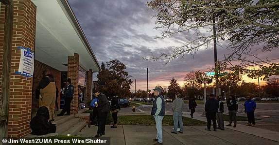 Mandatory Credit: Photo by Jim West/ZUMA Press Wire/Shutterstock (14868911f) Detroit, Michigan USA - 5 November 2024 - Voters wait for the 7:00 am opening of the polls at Bethany Lutheran Church in the 2024 presidential election. Voting in 2024 Presidential Election, Detroit, Michigan, USA - 05 Nov 2024