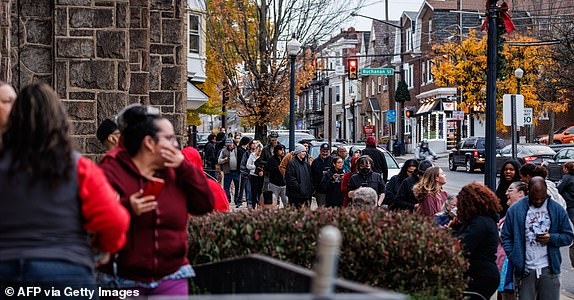 Voters line up outside of a polling station at St. John's Windish Evangelical Lutheran Church before the polls open on Election Day in Bethlehem, Pennsylvania on November 5, 2024. (Photo by SAMUEL CORUM / AFP) (Photo by SAMUEL CORUM/AFP via Getty Images)