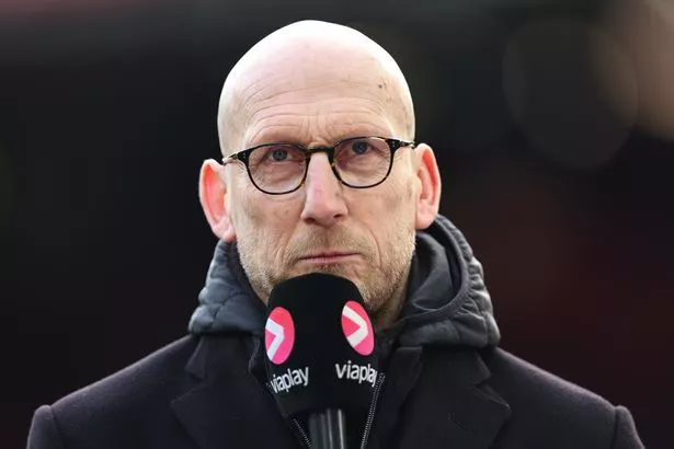 Former Manchester United defender Jaap Stam presenting the game for Viaplay Television