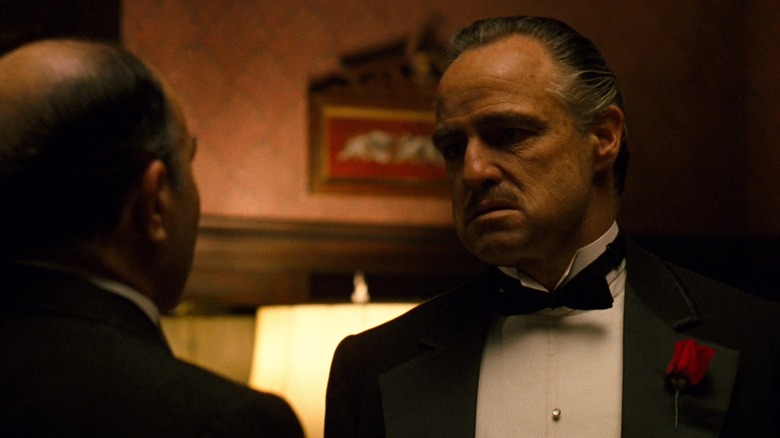 Vito Corleone listens to a request in The Godfather